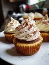White frosting on a cupcake.