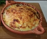 A dish of food in a bowl.