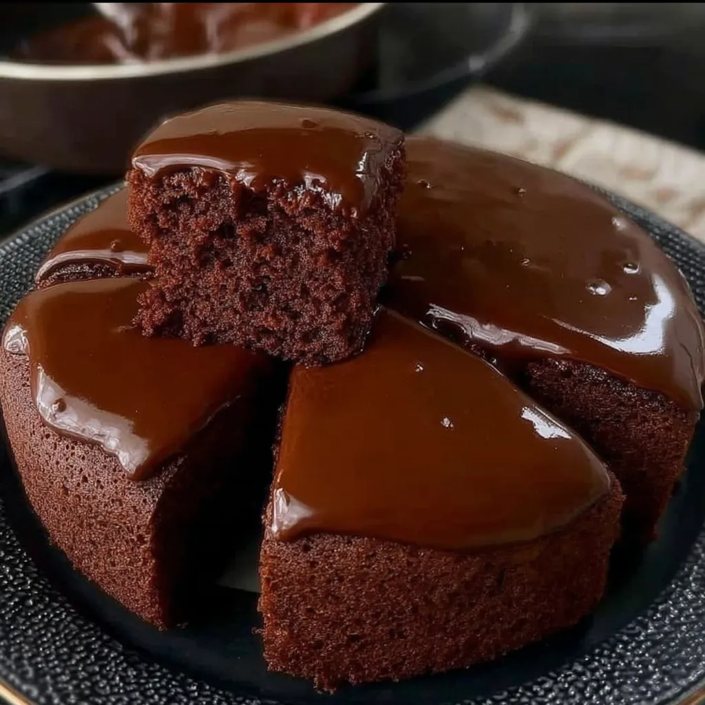 A slice of chocolate cake on a plate.