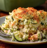 A plate of rice with vegetables.